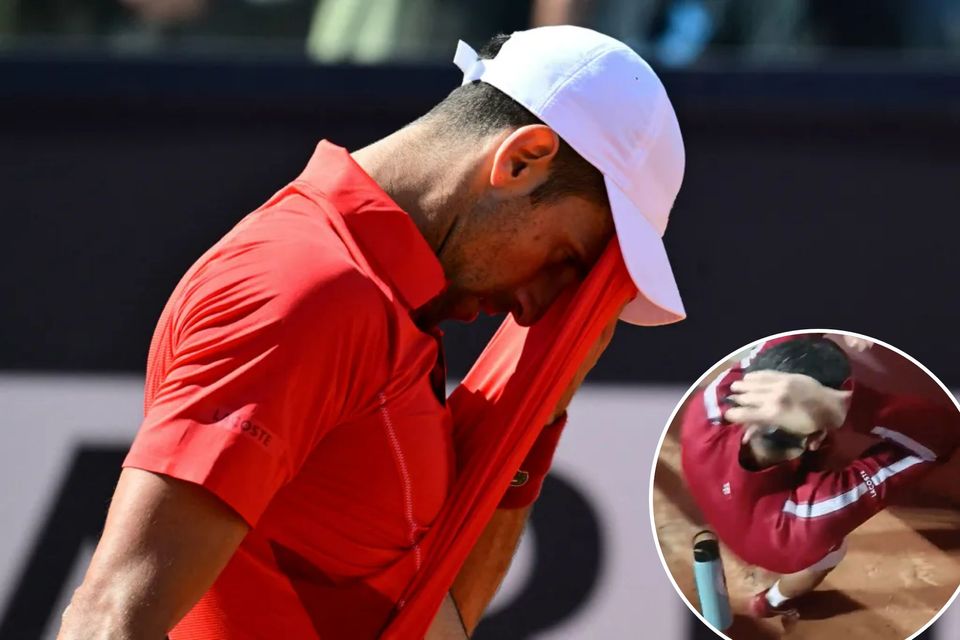 Novak Djokovic wears helmet after getting hit by water bottle-thumbnail