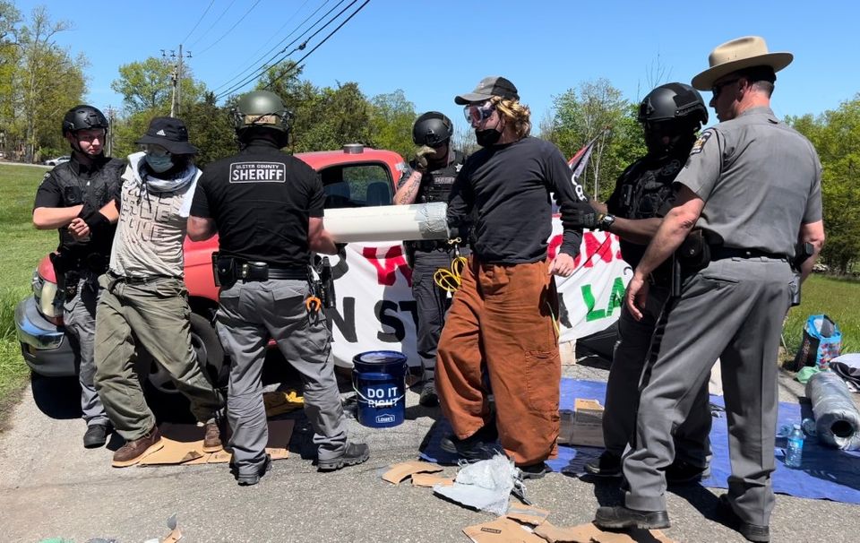 Police arrest protesters blocking entrances to Rotron in Woodstock-thumbnail